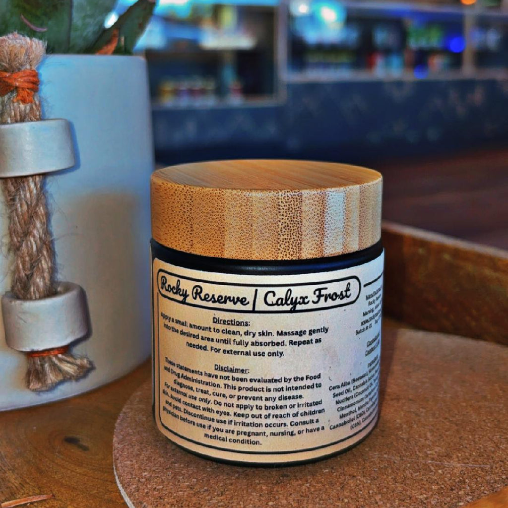 Jar with a label on a wooden surface in a blurred indoor setting